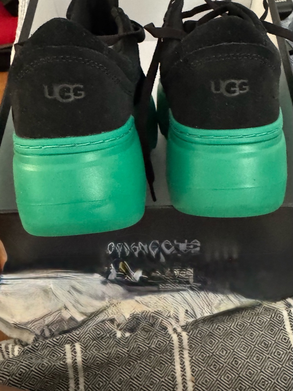 UGG unisex , very rare .Black Suede Sneakers with Teal-Green Sole